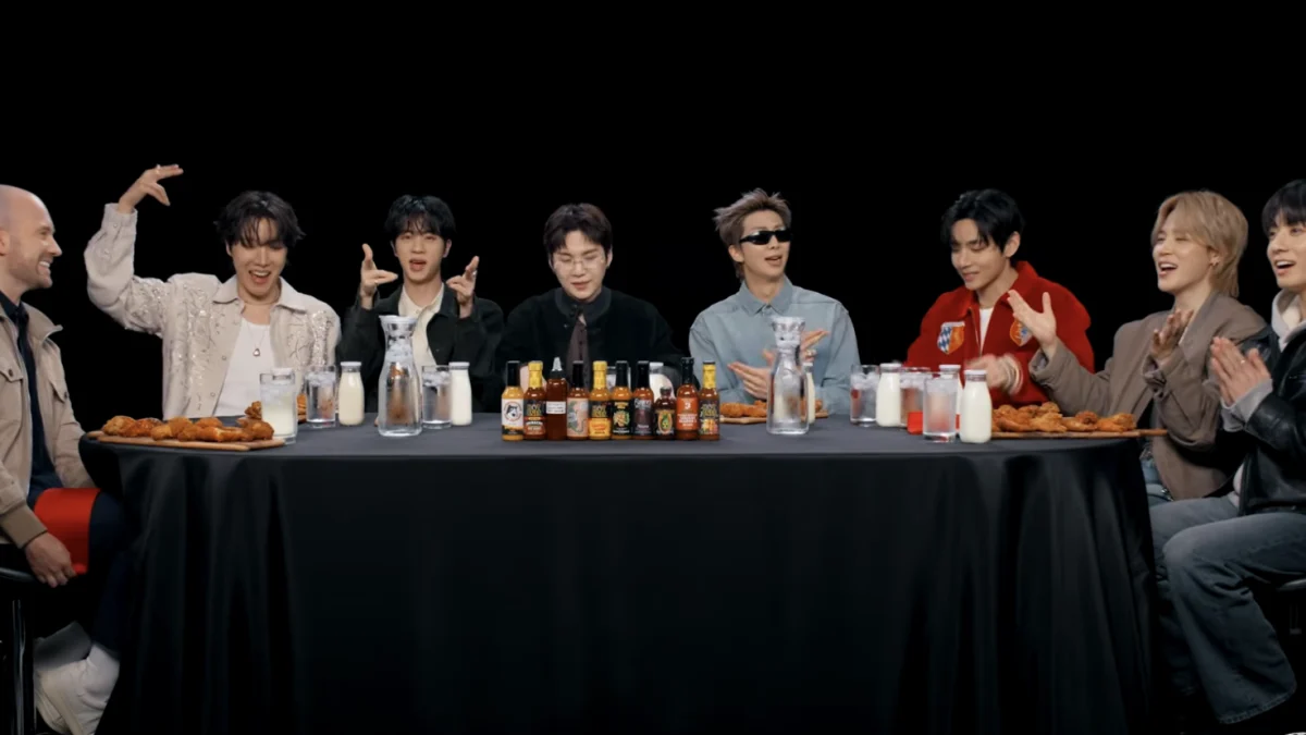 Milk, Tears, and Digital Nostalgia: Inside BTS’s Chaotic ‘Hot Ones’ Masterclass